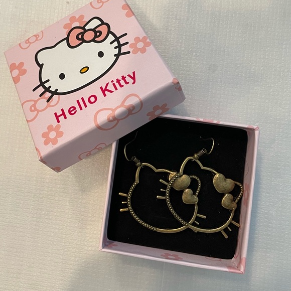Hello kitty hypoallergenic earrings with box and dust bag. NWT - Picture 3 of 3